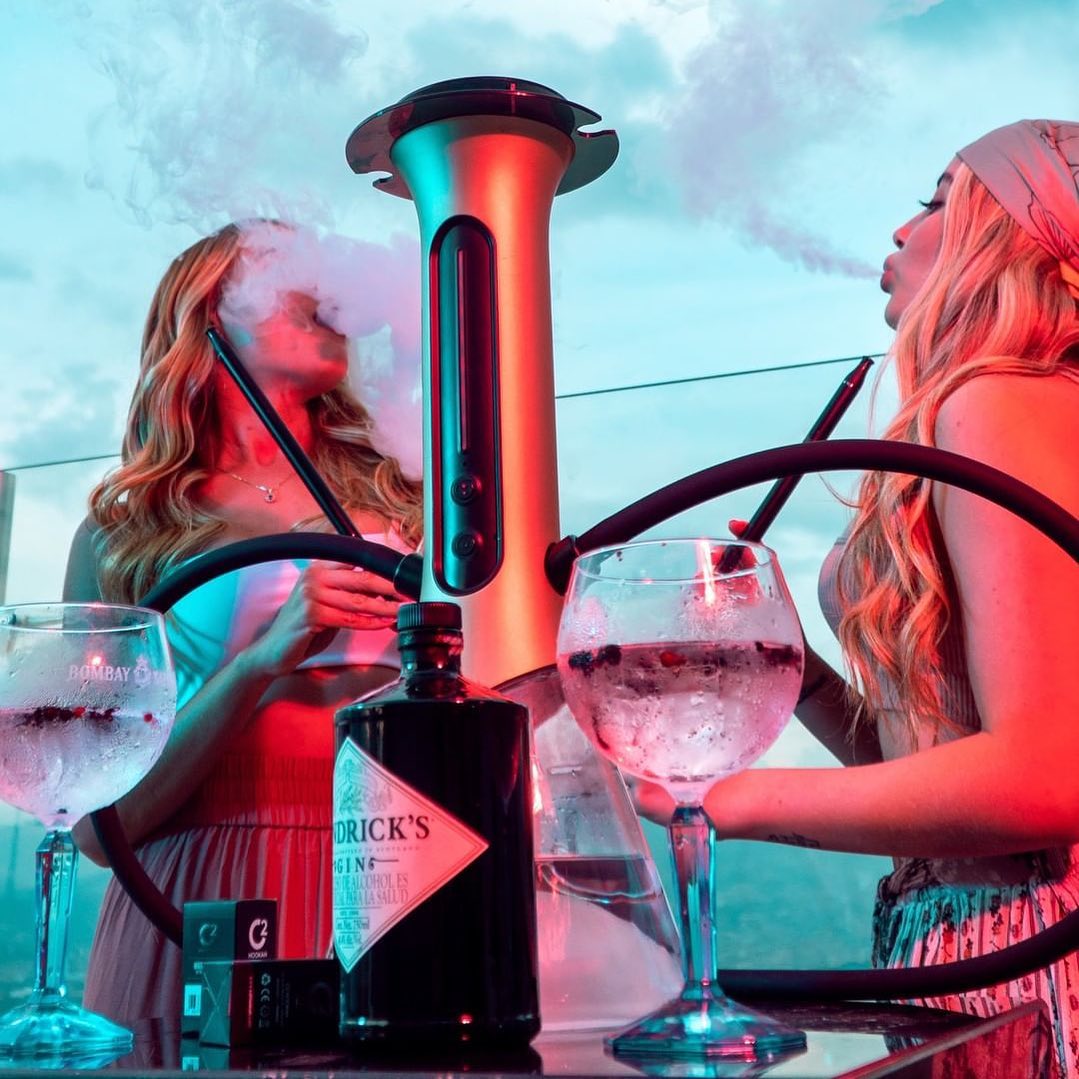 Women enjoying C2 Hookah lifestyle